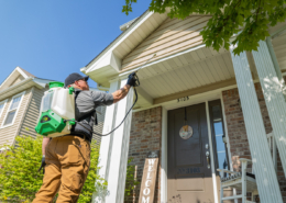 Amco Ranger exterminator conducting a thorough pest inspection in a residential home.