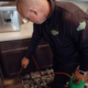 AMCO Ranger pest control technician treating a home for pests.