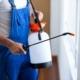 Emergency Pest Control in Missouri: When to Call, What to Expect, and How to Act Fast 5 A professional technician providing emergency pest control services by treating a home's interior window frame with specialized equipment.