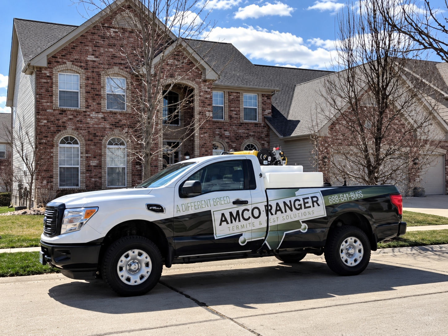 Lawn Pest Control in Missouri: Common Yard Pests and When to Call a Professional 2 Amco Ranger service truck outfitted for residential lawn pest control treatments in the St. Louis area